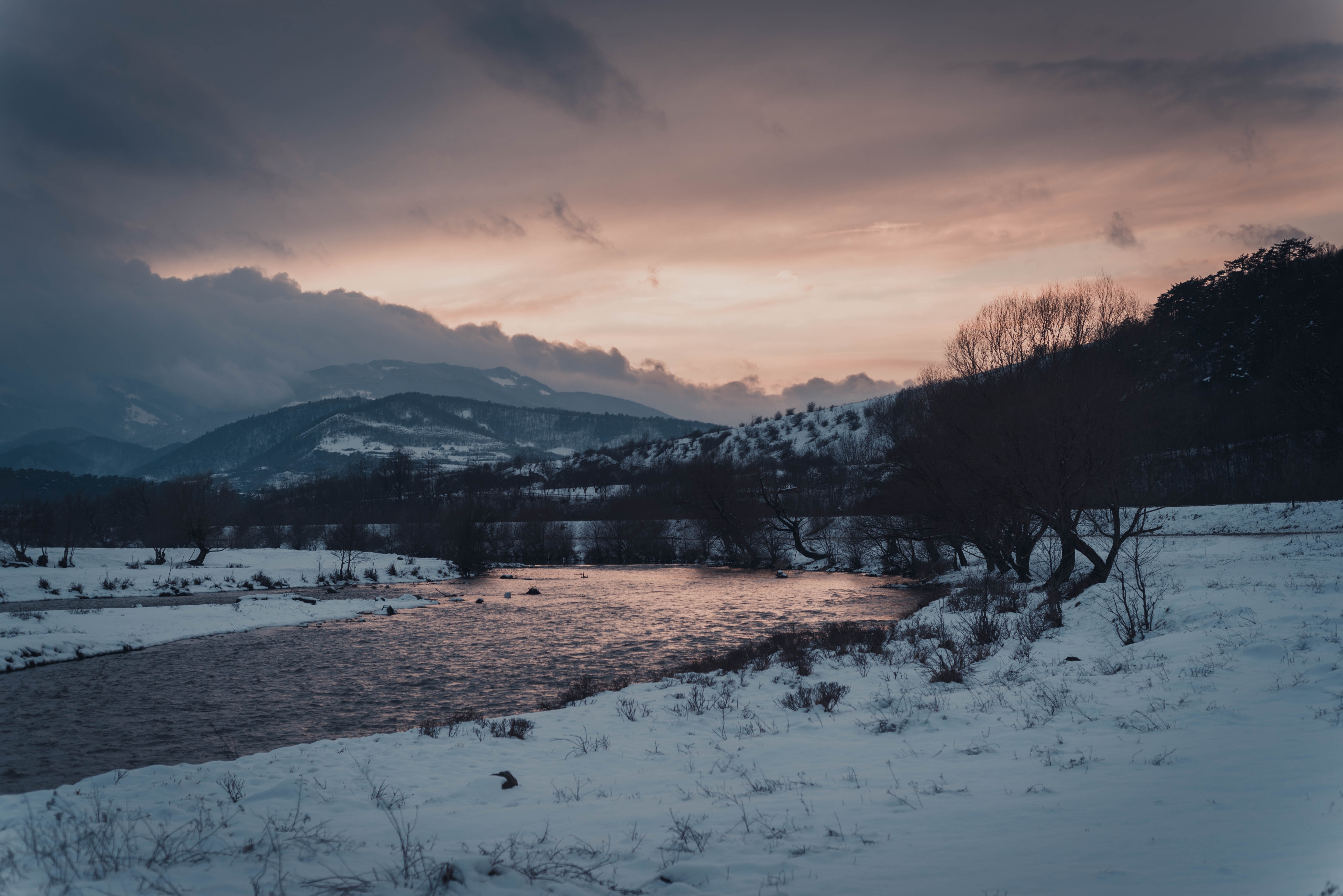 a_river_in_a_snowy_landscape