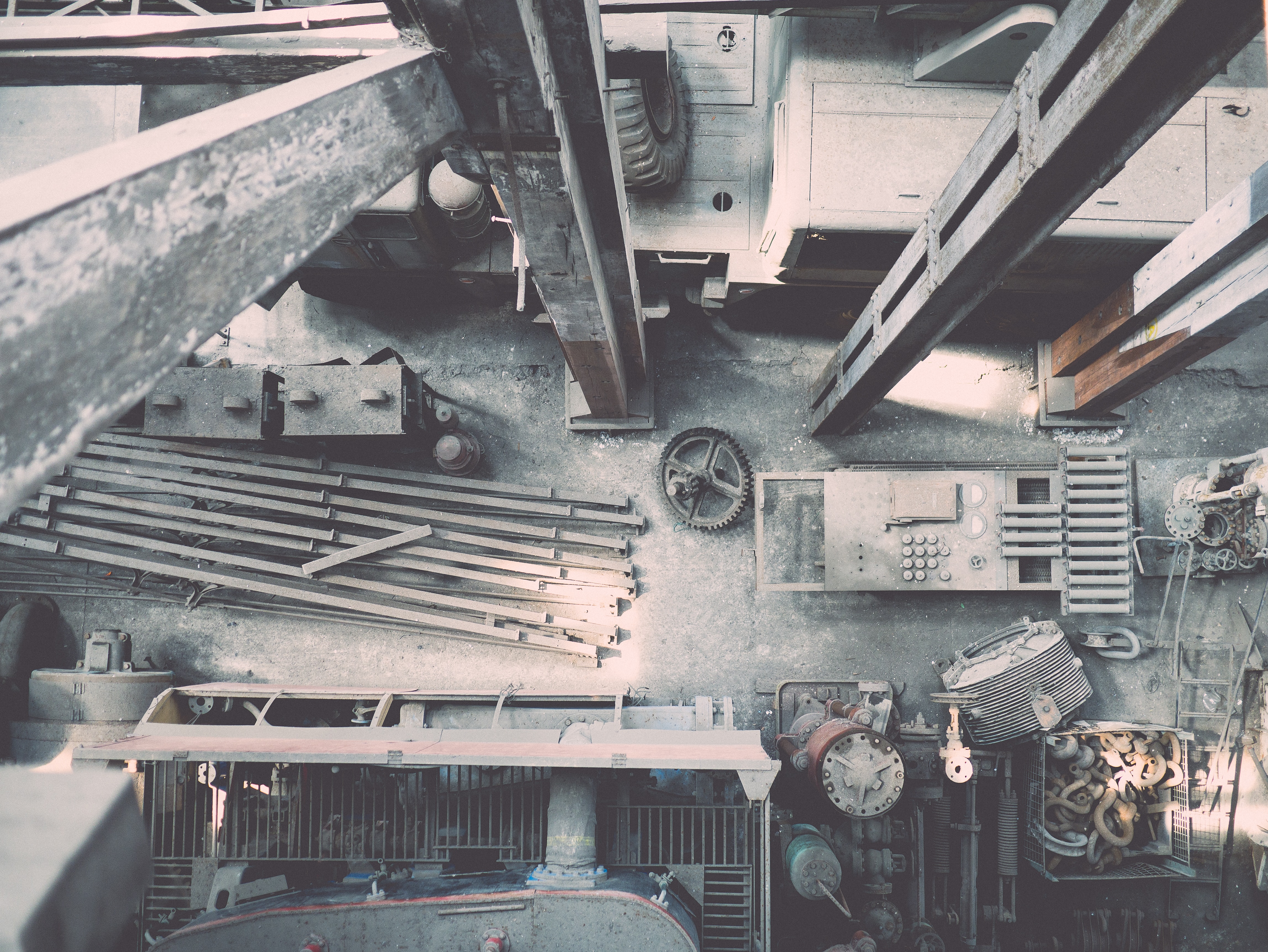 a_group_of_metal_objects_in_a_warehouse