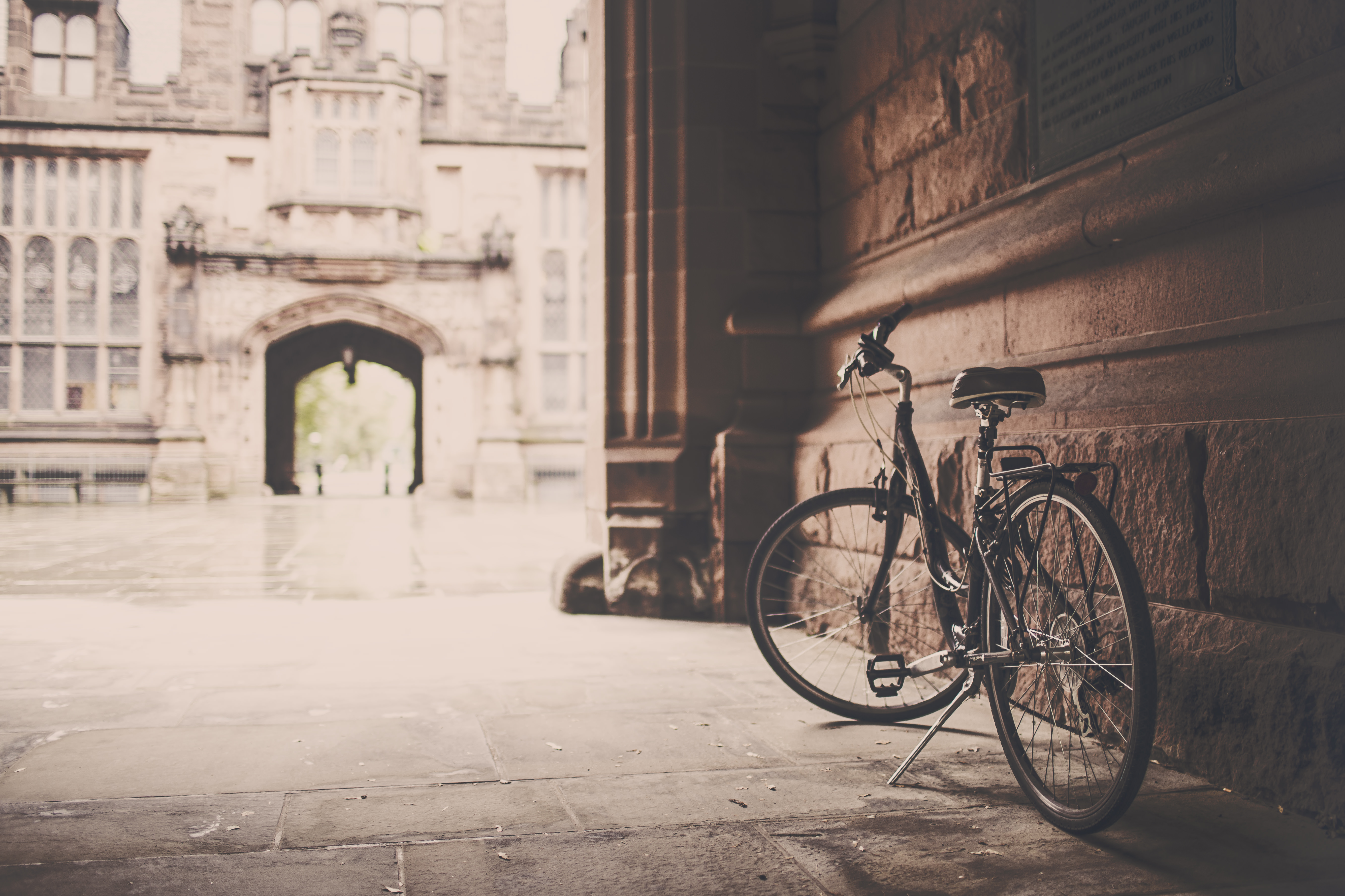 a_bicycle_leaning_against_a_wall