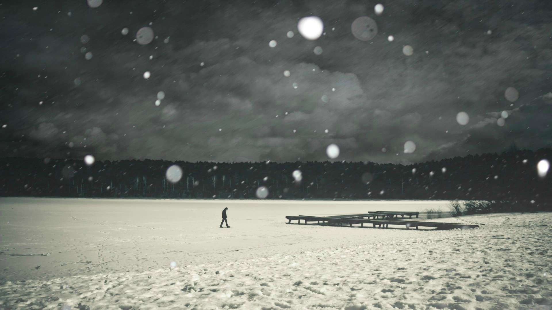 a_person_walking_in_the_snow