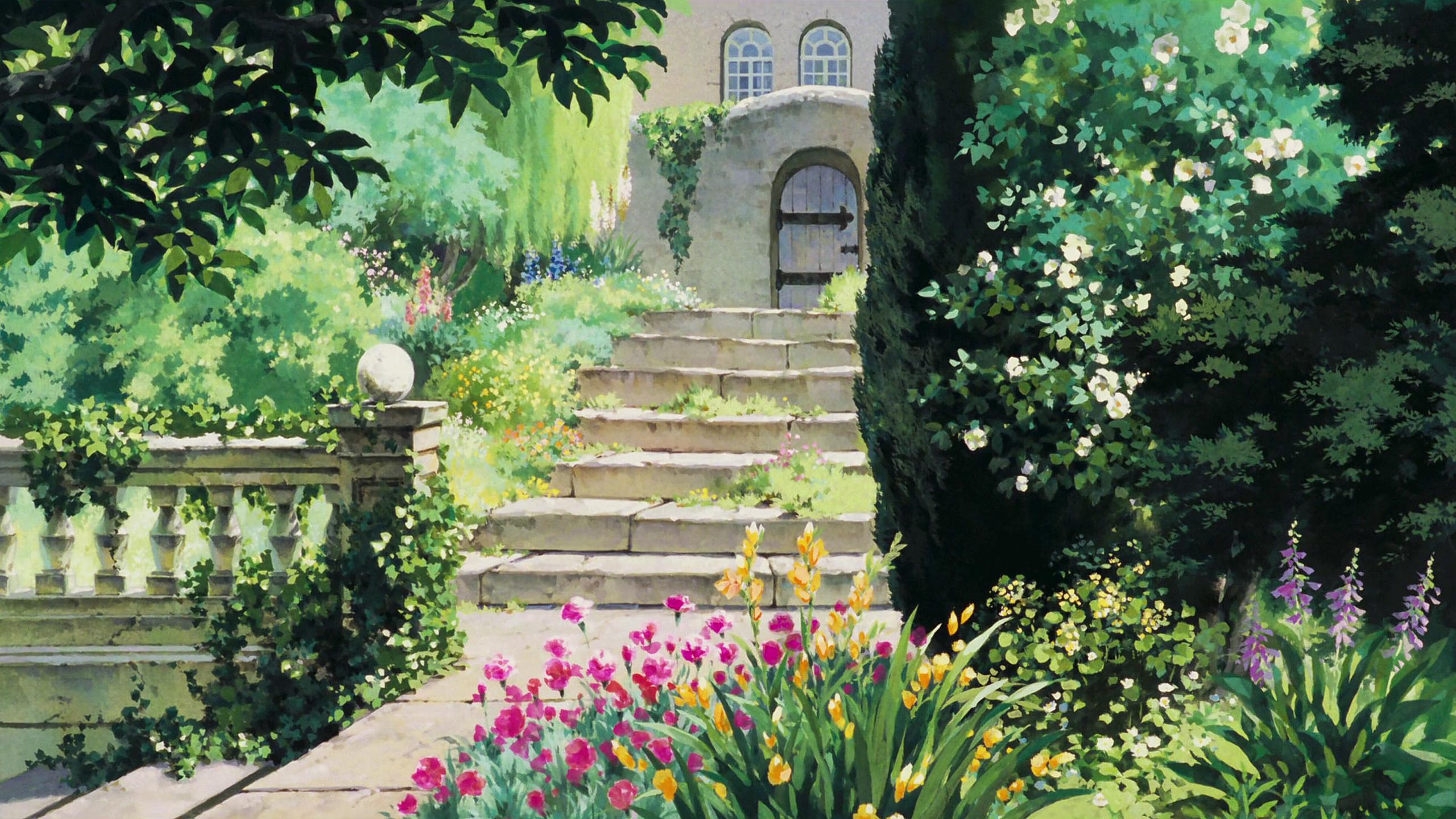 a_garden_with_stairs_and_flowers