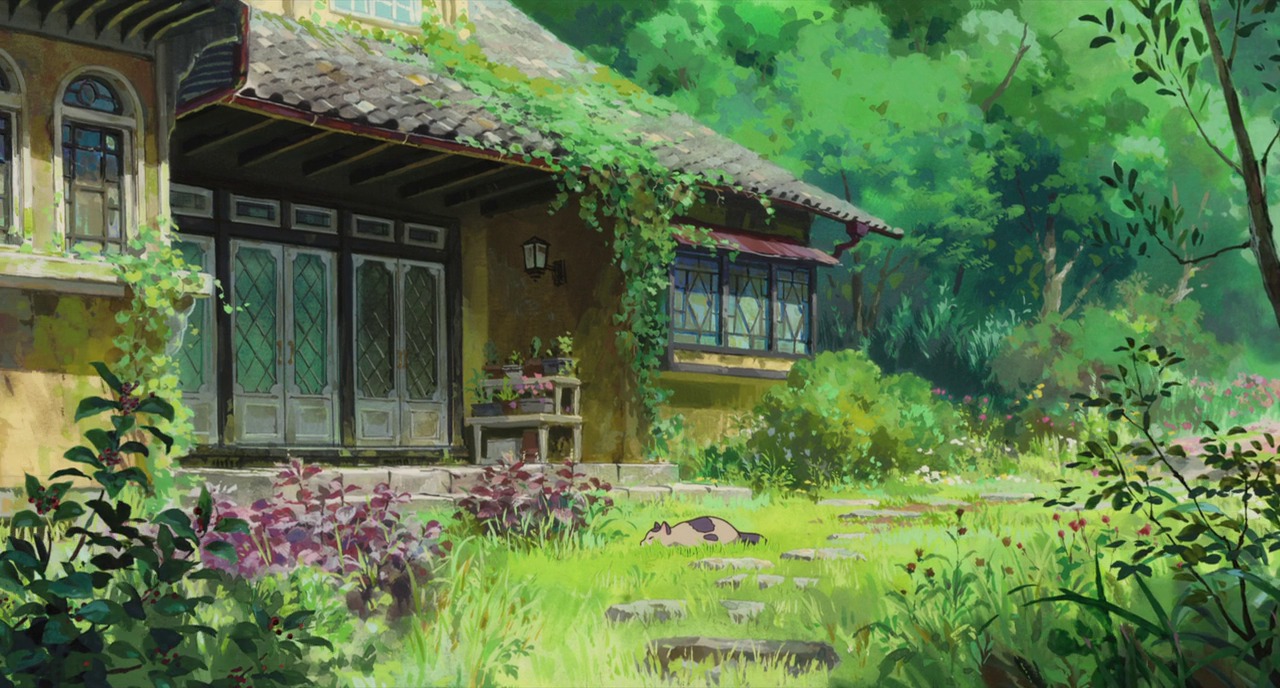 a_house_with_plants_and_flowers