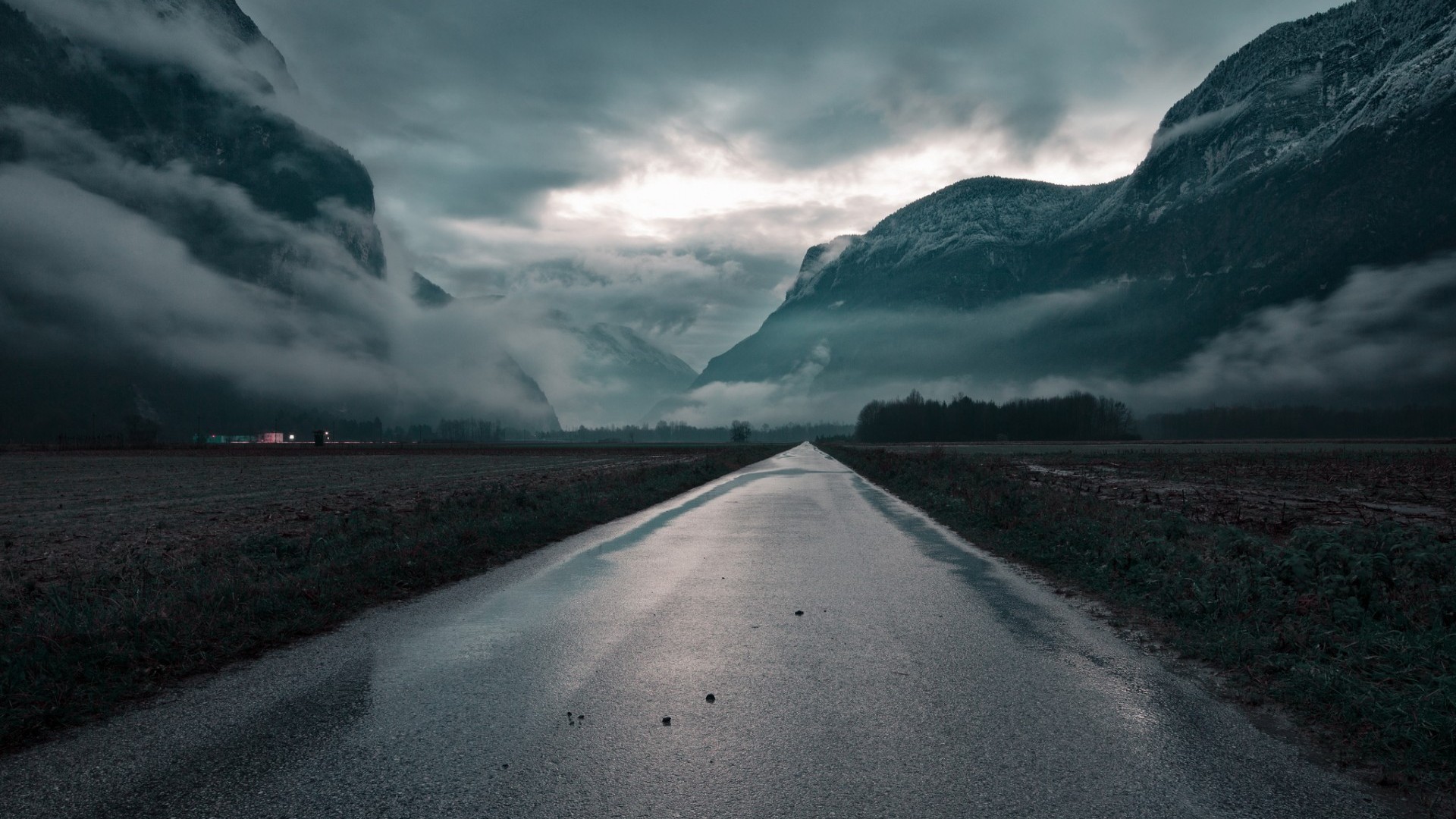 a_road_leading_to_mountains