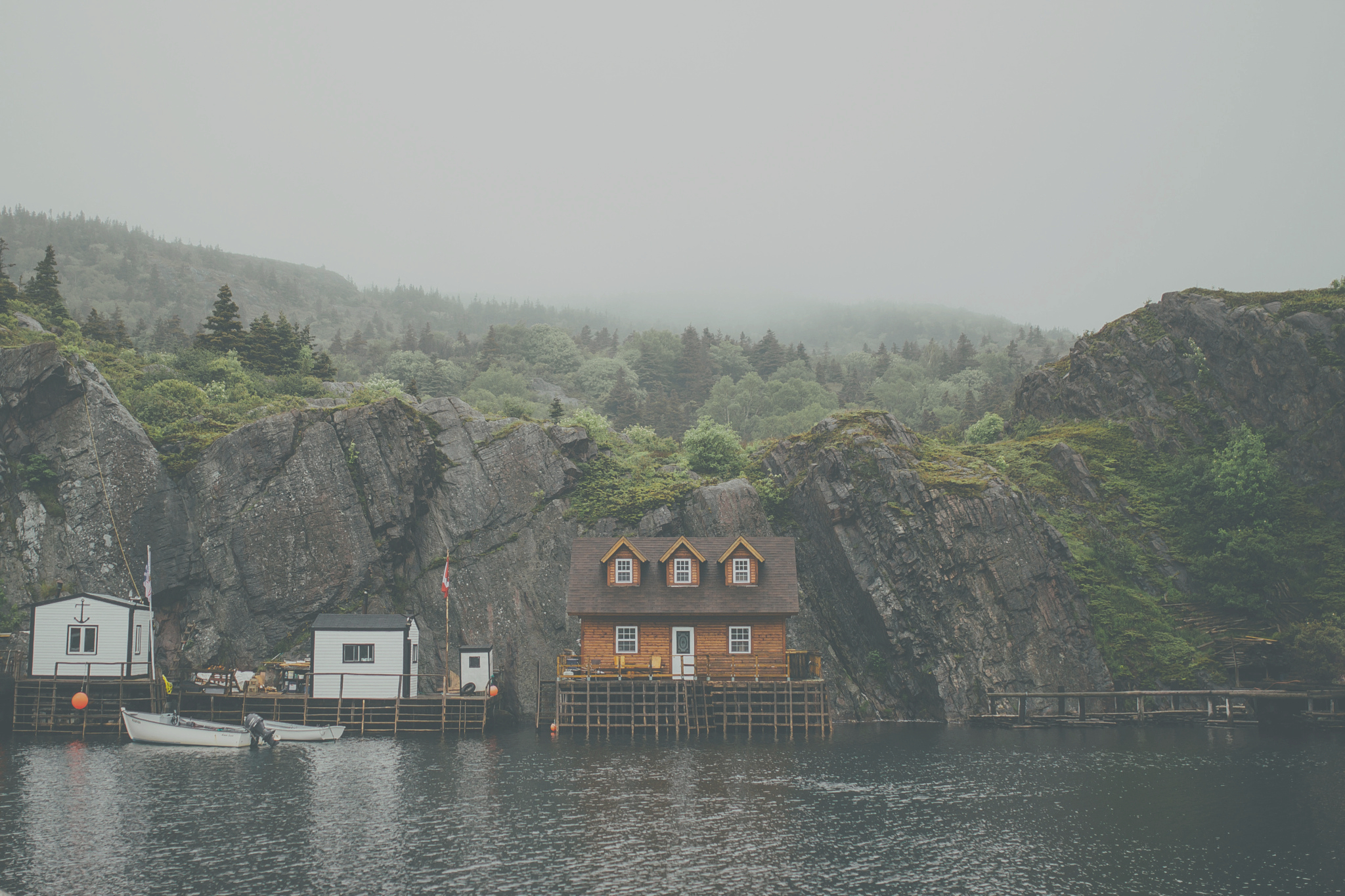 a_house_on_stilts_on_a_lake