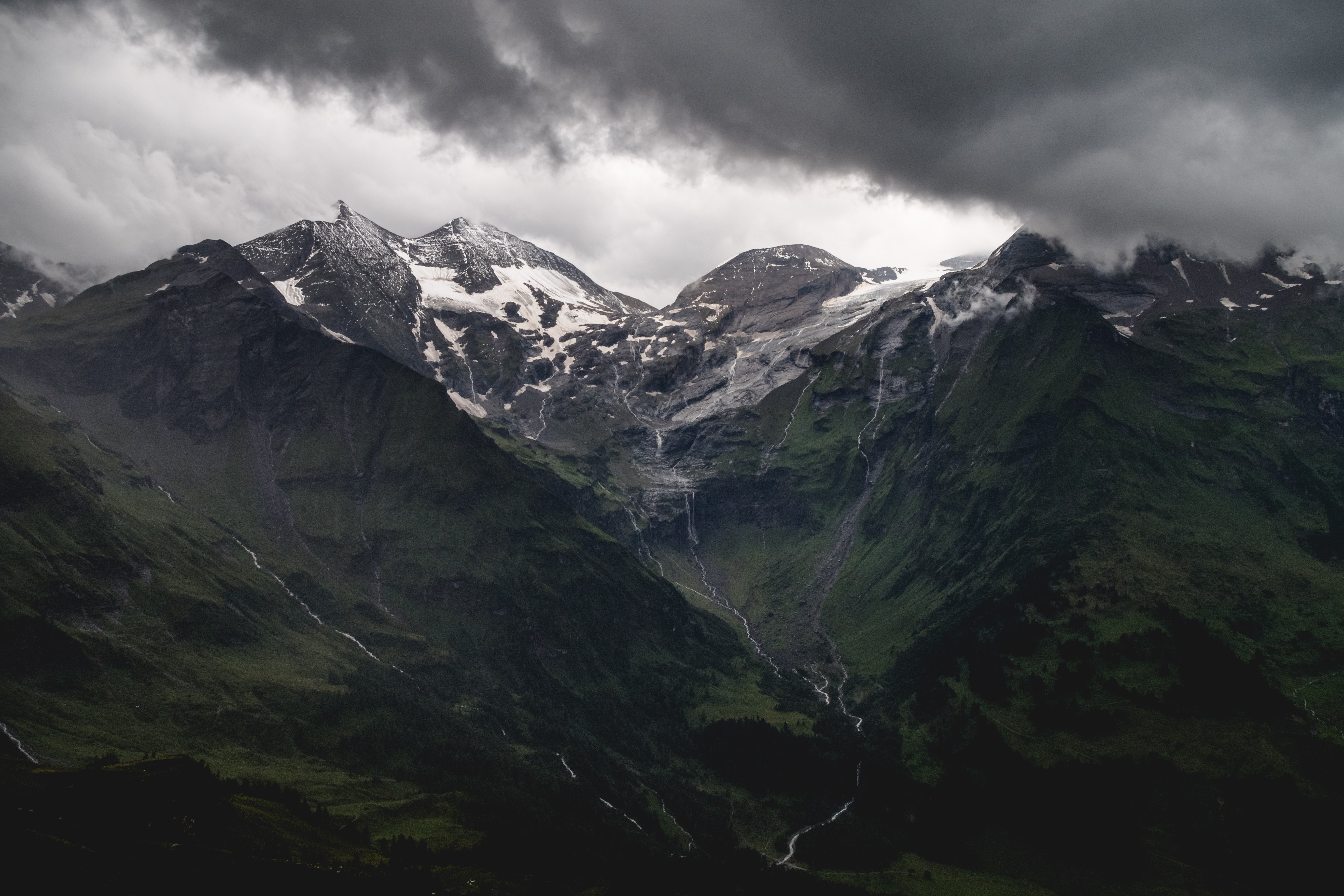 a_mountain_with_snow_and_clouds_01