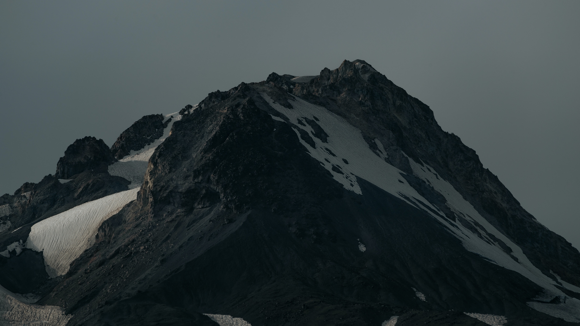 a_mountain_with_snow_on_top