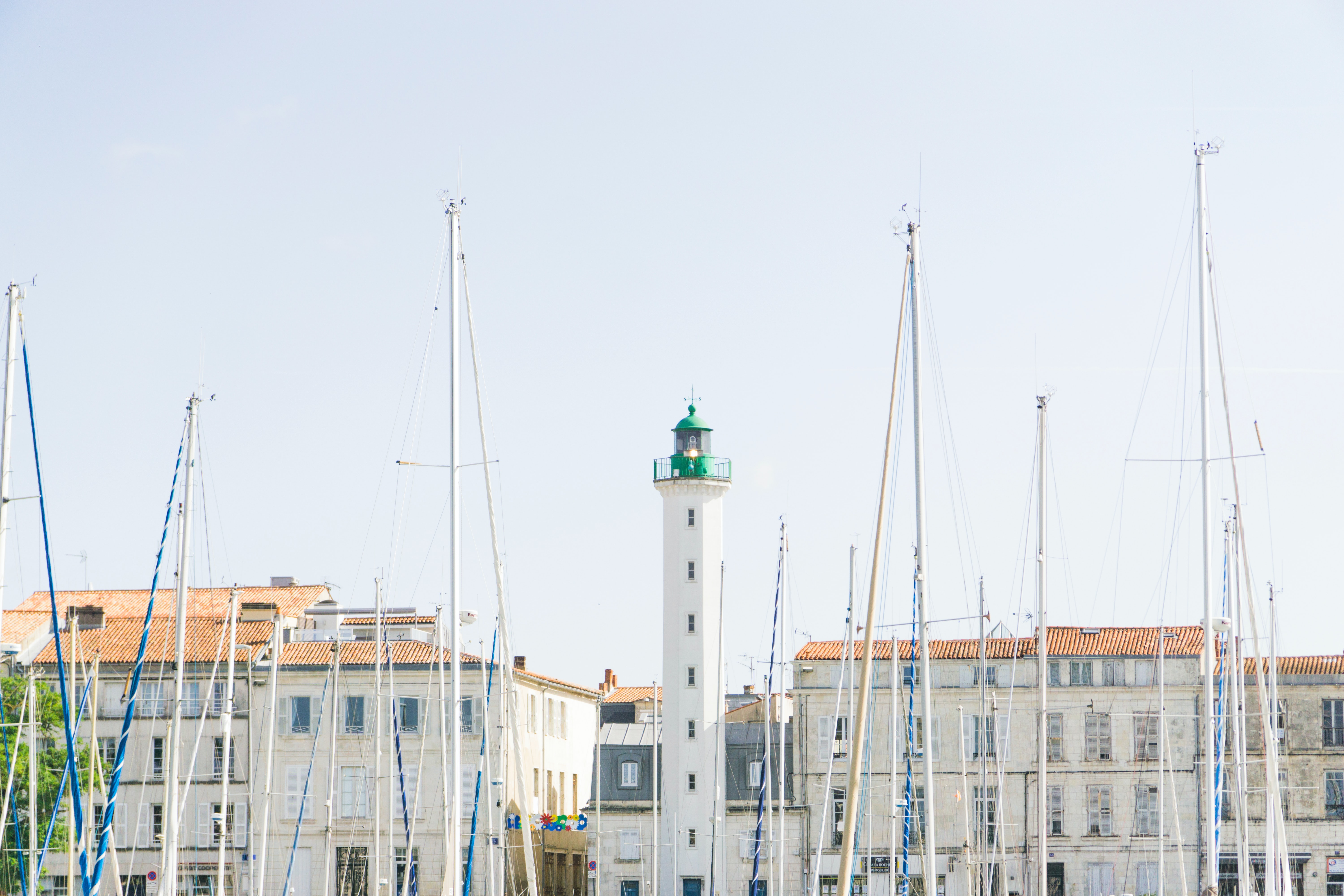 a_lighthouse_in_front_of_a_building