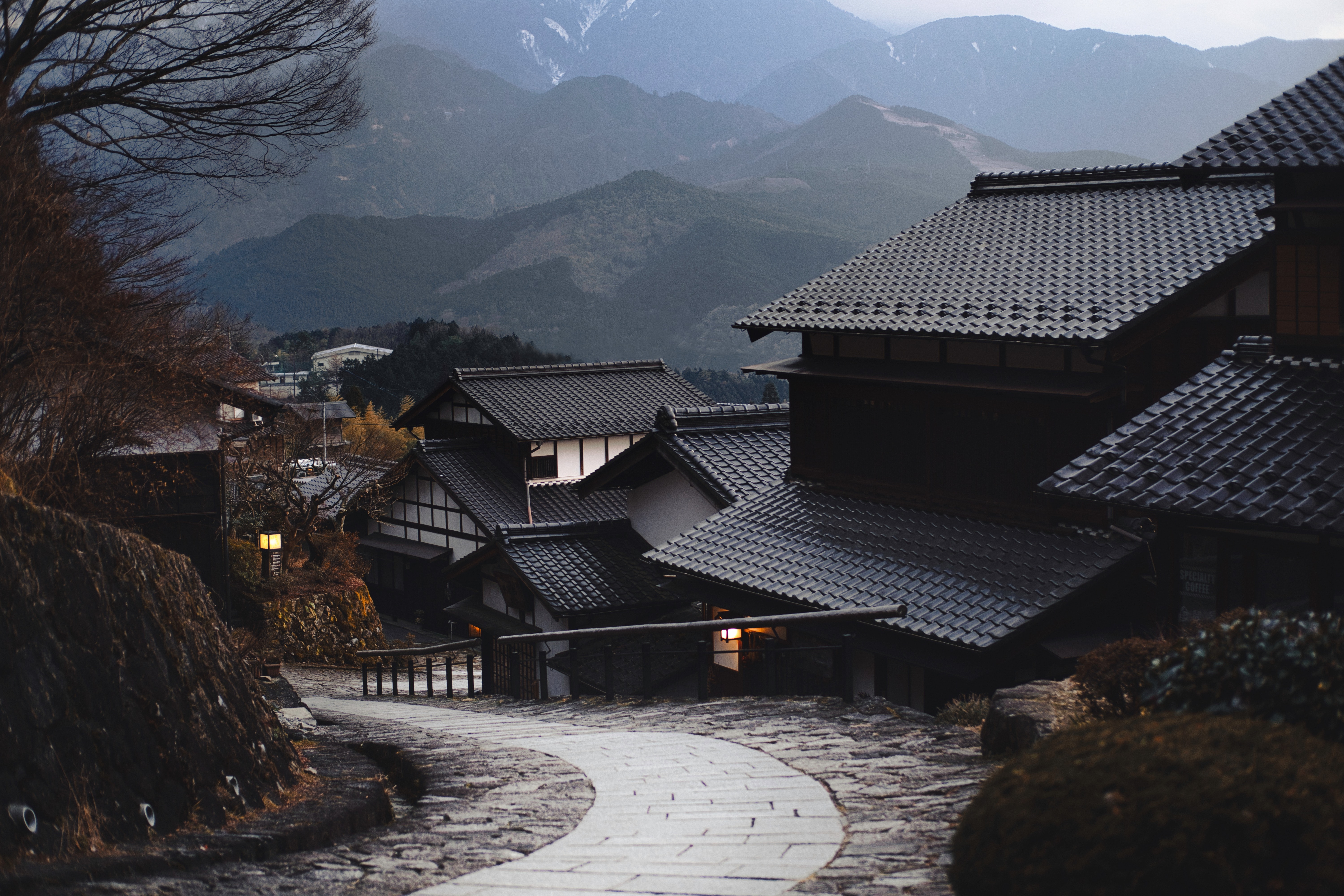 a_stone_path_leading_to_a_building