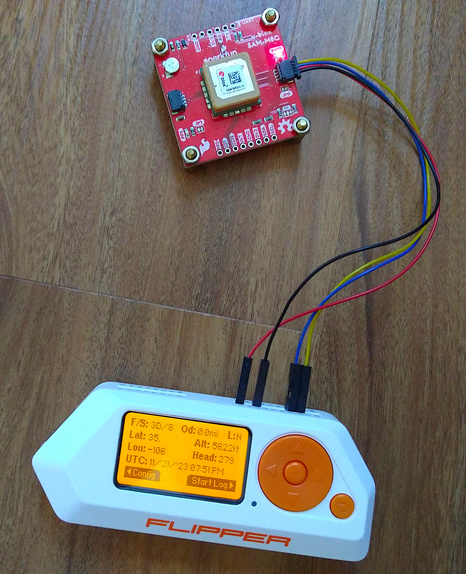 Flipper Zero connected to a u-blox GPS, running the u-blox app