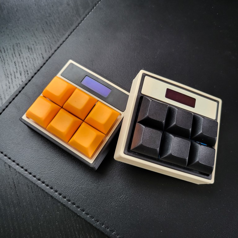 Two macropads 3d printed with different colors