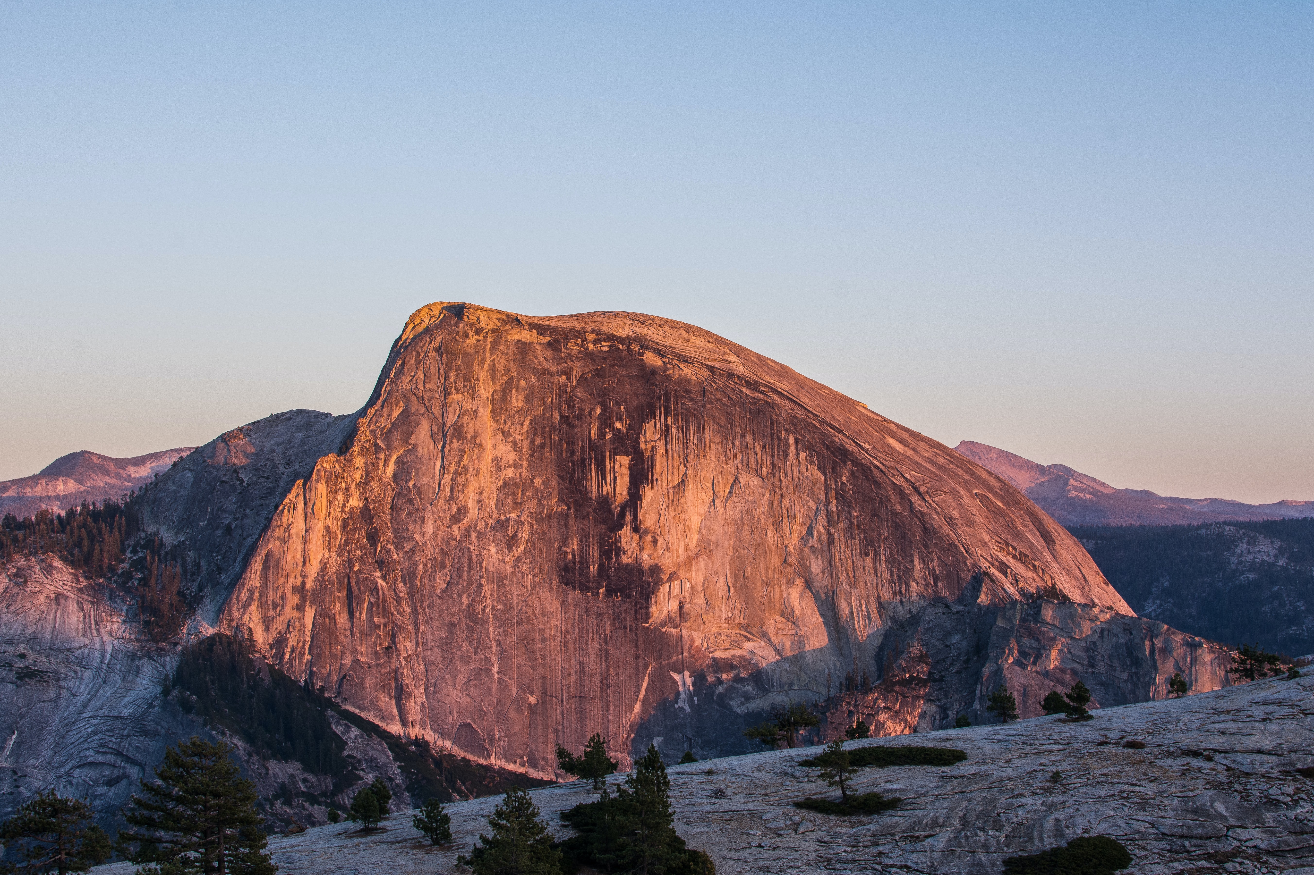 a_large_rock_formation_in_the_mountains